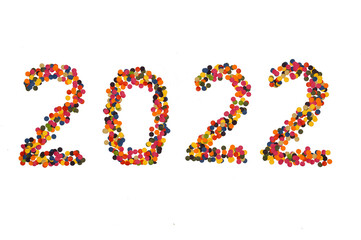new year 2022. preparing for the holiday. numbers made of colored circles. confetti figures on a white background.