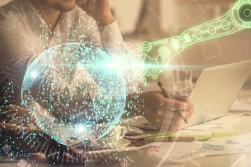 Double exposure of man and woman working together and technology theme drawing hologram. Big data concept. Computer background.