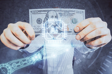 Double exposure of technology drawing hologram and us dollars bills and man hands. Data concept