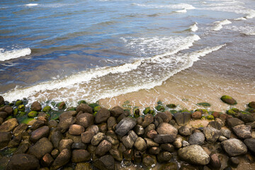 sea coast with lots of waves from windy weather