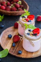Healthy smoothie of fresh summer berries. Creative atmospheric decoration