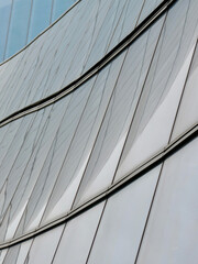 Fototapeta premium Grey lined surface of urban buildings in San Sebastian, Basque country, Spain. Modern lines for backdrops and backgrounds