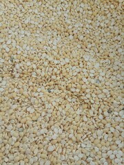 Background of broken Mung Lentils (Moong Dal)