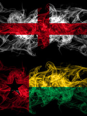 Flag of England, English and Guinea Bissau countries with smoky effect