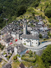Obraz premium Aerial image with drone of the mountain village Corippo - the smallest commune in Canton Ticino, Switzerland