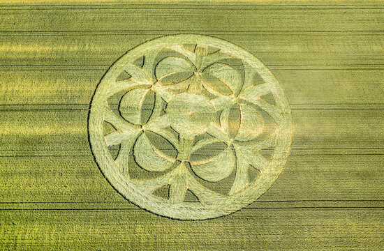 Canton Bern, Switzerland - July 05, 2019: mysterious crop circle emerged overnight in wheat field with beautiful pattern.