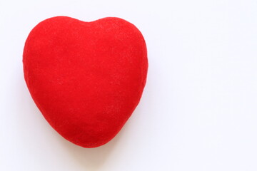 Red heart on a light background. 