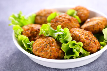 falafel and lettuce in bowl