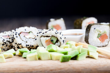 made from rice and trout or salmon with vegetables sushi food