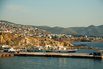 Fototapeta na wymiar View of famous port and city of Rafina where passenger ferries travel to Aegean islands, Attica, Greece