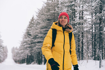 Fototapeta na wymiar Happy woman exploring winter nature