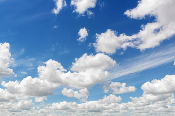 Natural beautiful abstract scenic azure blue sky with white cumulus clouds background on bright...