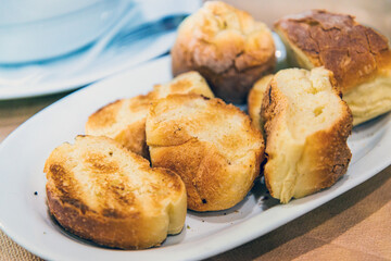 Delicious breakfast bread on table