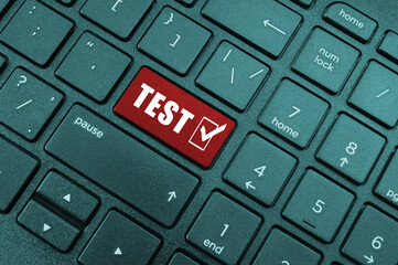 Laptop keyboard with test button