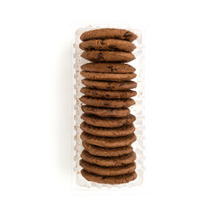 Brown biscuits in a plastic container isolated on white background.