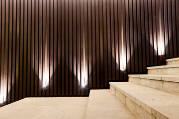 number of spot lamps for night illumination of decorative slats of the stairs