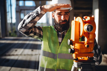 Picture of man construction engineer working on building site