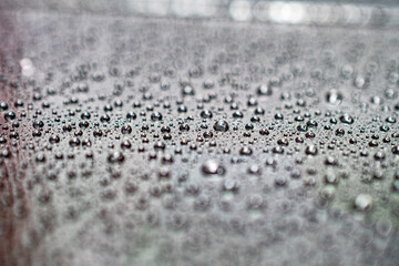 Drops of water on surface, abstract background