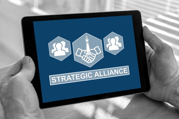 Strategic alliance concept on a tablet