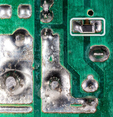 Circuit board with microcircuits as a background.