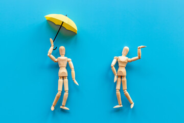 Man and woman connection. Couple of wooden mannequin figures.
