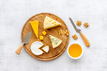 Set of different types of cheese. Camembert parmesan and brie cheeses 