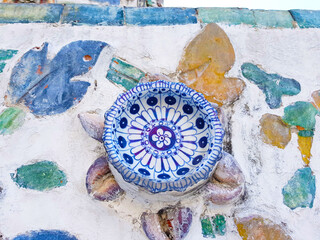 Wall decorations of Wat Arun in Bangkok, Thailand