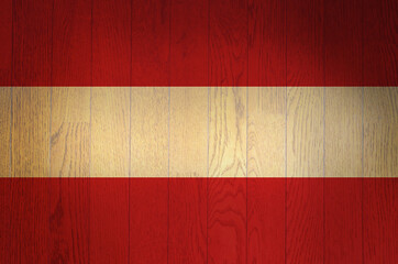 The flag of Austria on a grunge wooden background.