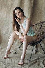 Naklejka premium Close up woman portrait, flexibility sensual body in bikini underwear