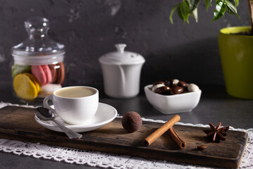Cup of coffee on wooden board table background. Set of coffee and sweets food ingredient