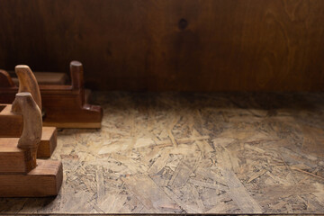 Woodworking tools on wooden table. Wood plane jointer carpenter tools or joiner tool as still life