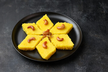 Rava kesari , Kesari bath , sheera or suji halwa  Indian sweet  food.mithai for Diwali ,pongal, dussehra ugadi Karnataka, Tamil Nadu , south Indian , North Indian, Sri Lanka Semolina pudding dessert