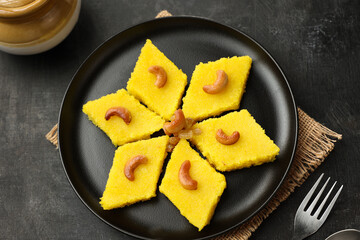 Rava kesari , Kesari bath , sheera or suji halwa  Indian sweet  food.mithai for Diwali ,pongal,  ugadi in Karnataka, Tamil Nadu , south Indian , North Indian, Sri Lanka Semolina pudding dessert