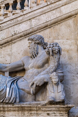 Fototapeta na wymiar Nile God statue in front of the Palazzo Senatorio (Senatorial Palace) at the Piazza del Campidoglio in Rome, Italy