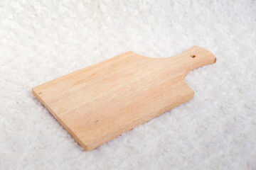 Wooden cutting board empty on white background