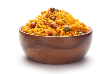 Close up of Teekha Meetha crunchy spicy Indian namkeen (snacks) In hand-made (handcrafted) wooden bowl