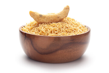 Close-Up of Indian spicy snacks (Namkeen) - Bikaneri Besan Bhujia In hand-made (handcrafted) wooden bowl, made with chickpea flour (Besan),