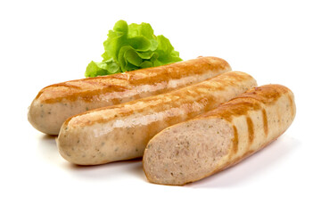 Grilled Munich sausages with lettuce, isolated on white background.