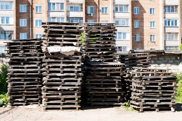Wooden pallets for transportation of oversized cargo in the warehouse.