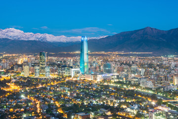 Skyline of Santiago de Chile at the foots of The Andes Mountain Range and buildings at Providencia district.