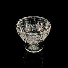 antique crystal rose bowl on black background