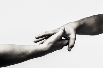 Close up help hand. Helping hand concept, support. Helping hand outstretched, isolated arm, salvation. Black and white