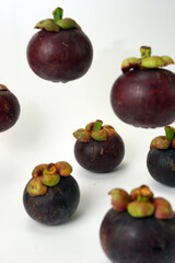 Fresh Mangosteen with mangosteen skin. Known as full vitamin fruit