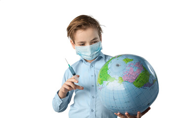 boy in a protective mask against infection, coronavirus holds a ball in the face of the ground and...