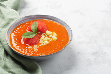 A plate of traditional Spanish vegetable gazpacho with water melon
