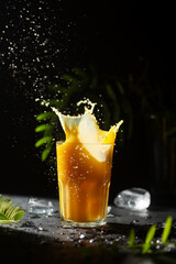 Non-alcoholic cooling drink with splashes and drops