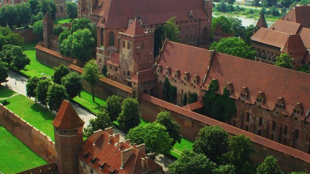 Aerial view of the Teutonic castle in Malbork. Located by the River Nogat, summer day view