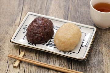kohaku ohagi; pounded rice covered by sweetened red and white adzuki bean paste, japanese traditional dessert
