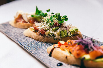 snack. appetizer with salmon and micro green.