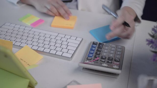 salary employee working at her desk in the office during office hours.
